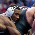 ¿Quiénes son los cuatro veces campeones de lucha libre del estado de Iowa de todos los tiempos?